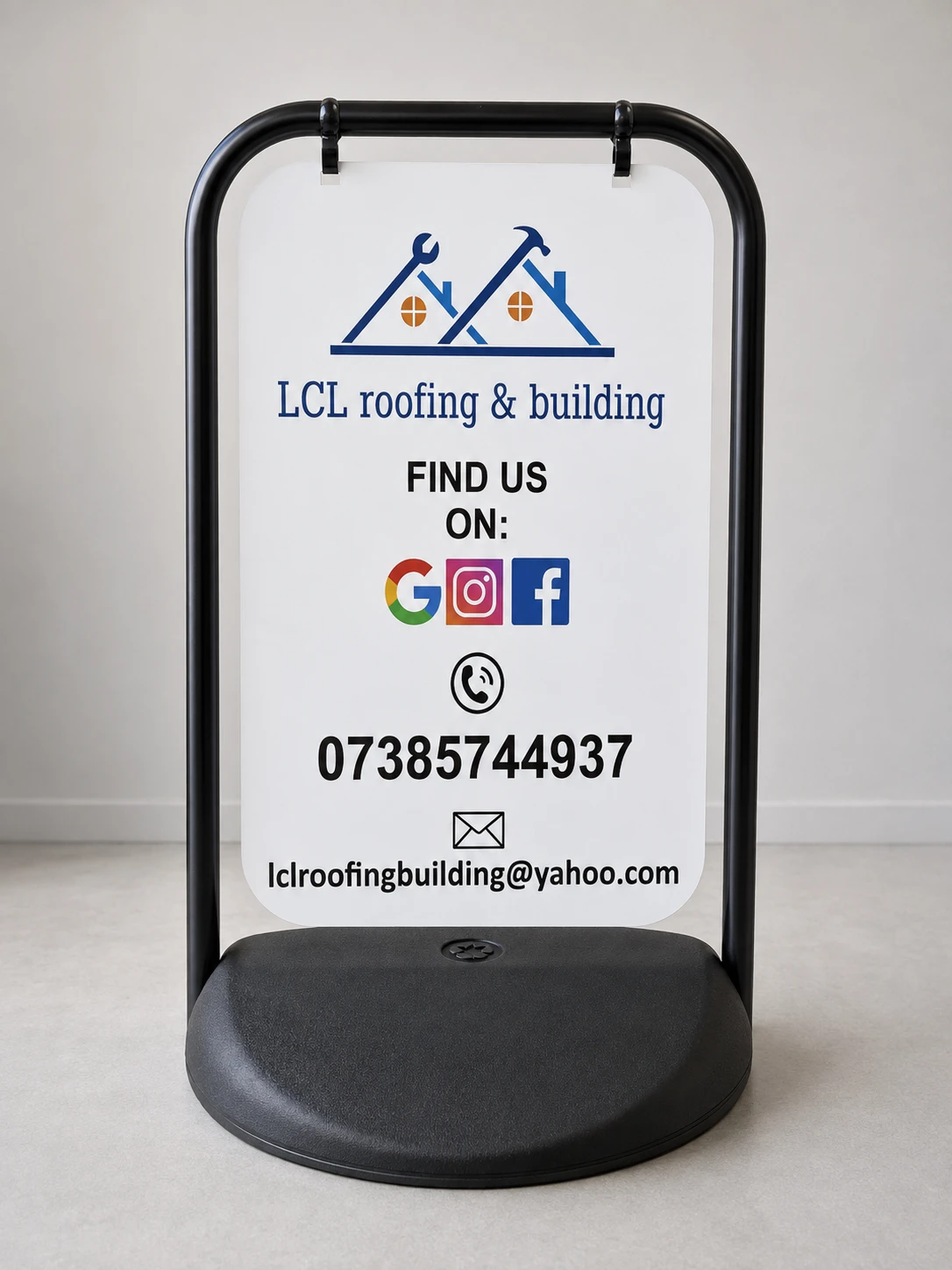 Pavement Sign B with a black oval steel frame and weighted black base