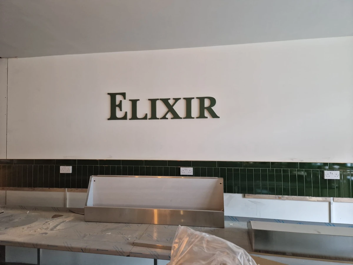 Raised interior business lettering by Total Sign Solutions