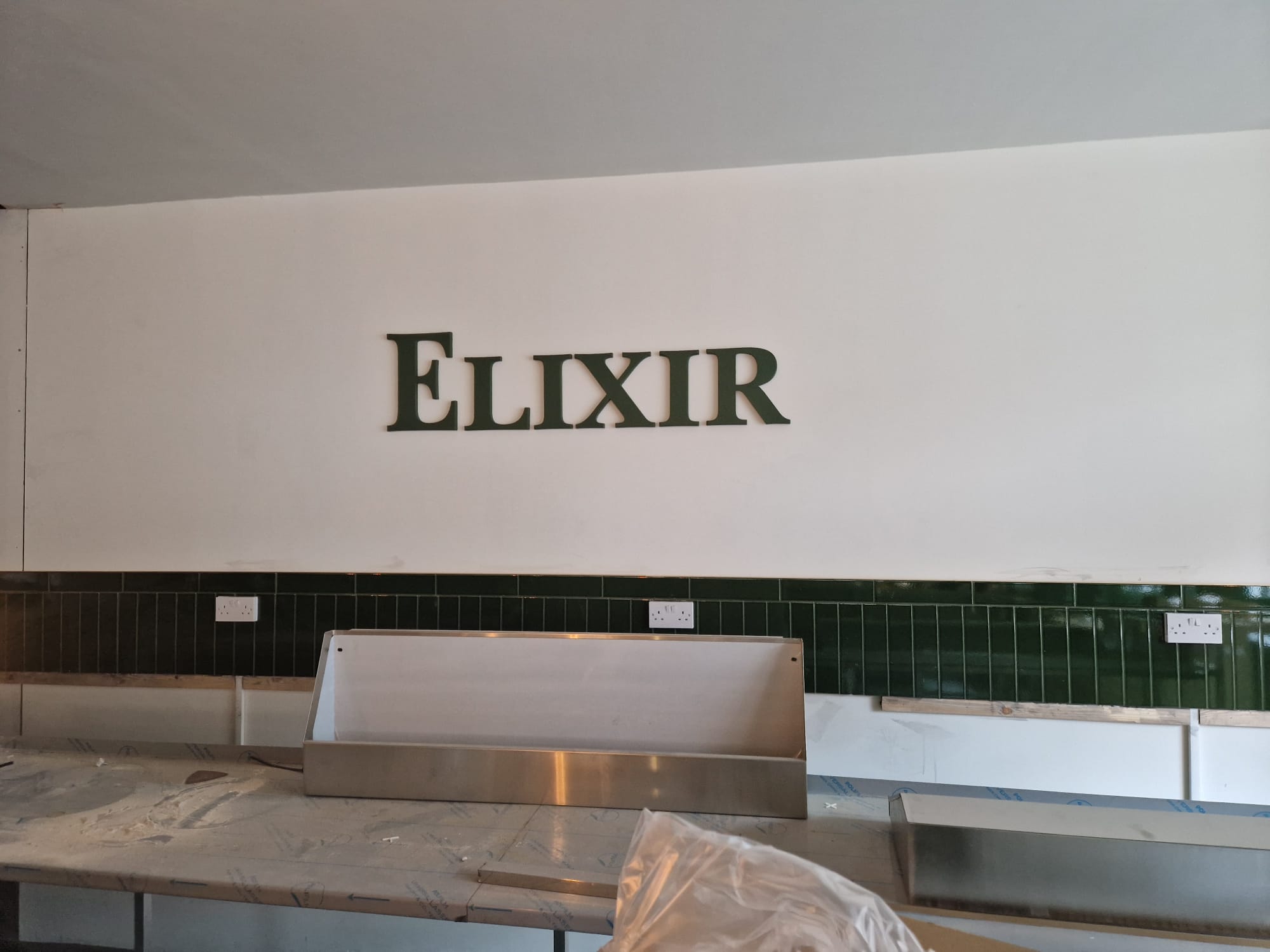 Raised interior business lettering by Total Sign Solutions