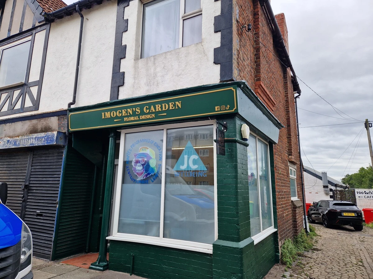Illuminated shop sign for Imogen’s Garden in Hoylake, Wirral