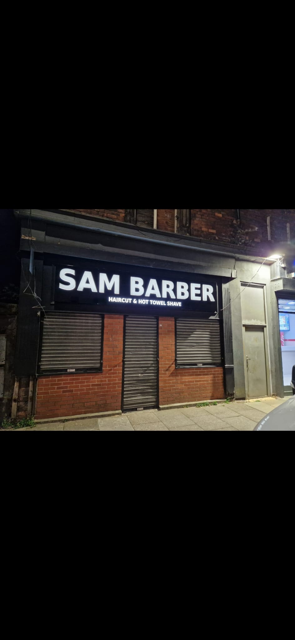 External barber-shop sign by Total Sign Solutions